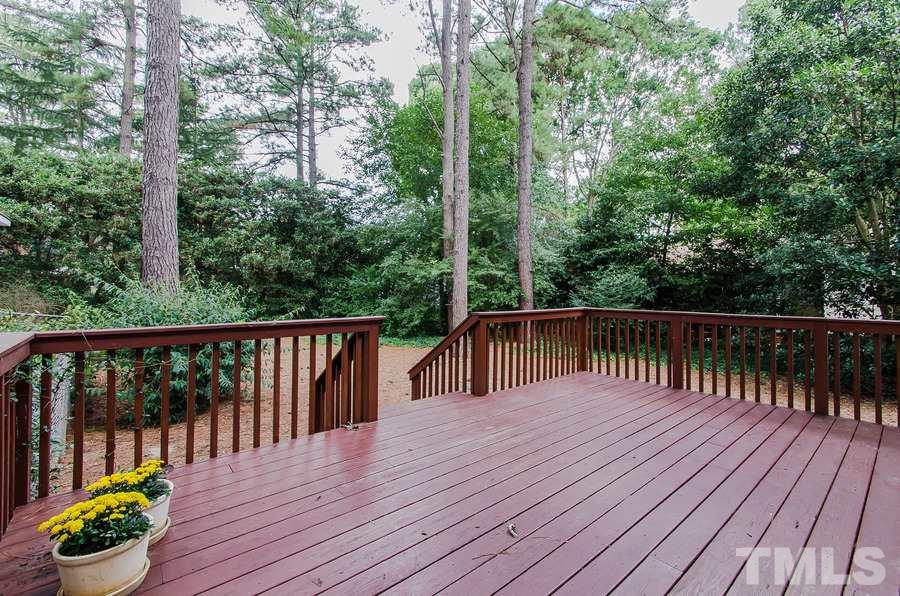 2705 Wycliff Road Raleigh, NC 27607 - Photo 19 of 22 a balcony with wooden floor and wooden floor
