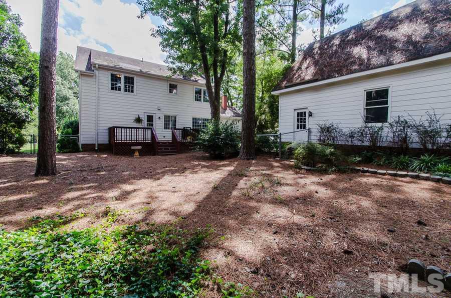 2705 Wycliff Road Raleigh, NC 27607 - Photo 20 of 22 a view of a house with backyard and sitting area