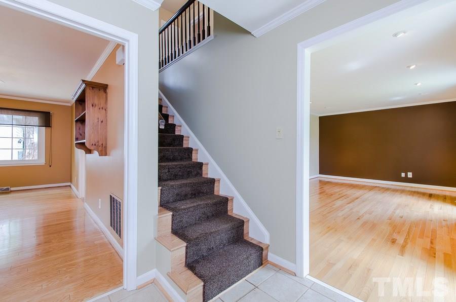 2705 Wycliff Road Raleigh, NC 27607 - Photo 3 of 22 a view of entryway and hall with wooden floor