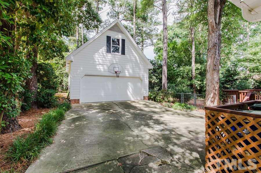 2705 Wycliff Road Raleigh, NC 27607 - Photo 22 of 22 a view of a house with a yard