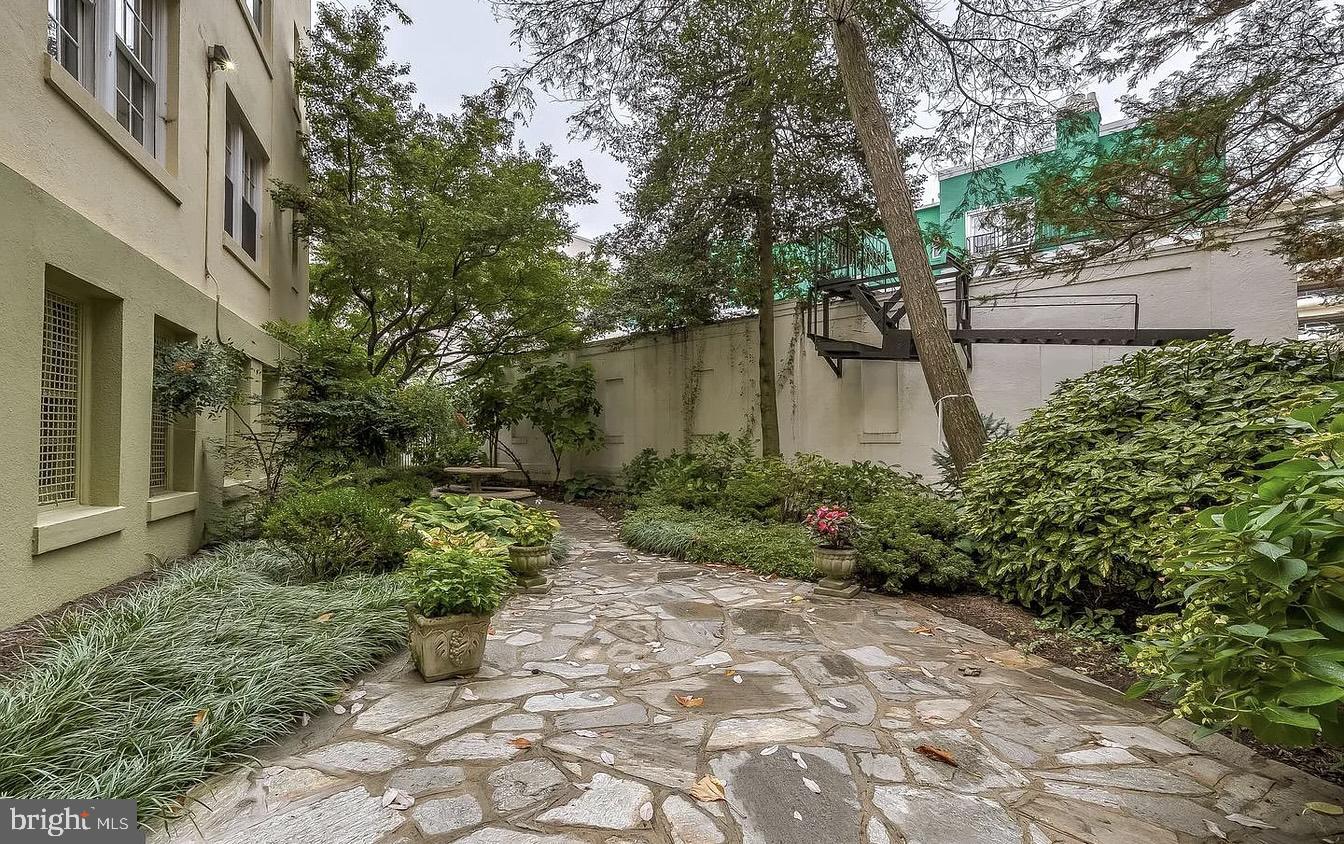 3401 Greenway, Unit 50 Baltimore, MD 21218 - Photo 11 of 12 a view of a pathway both side of house