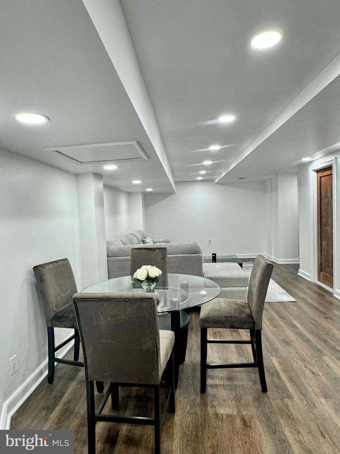3401 Greenway, Unit 50 Baltimore, MD 21218 - Photo 3 of 12 a view of a dining room with furniture