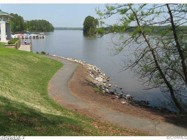 14716 Ridge Point Drive Midlothian, VA 23112 - Photo 24 of 24 a view of a lake with a yard