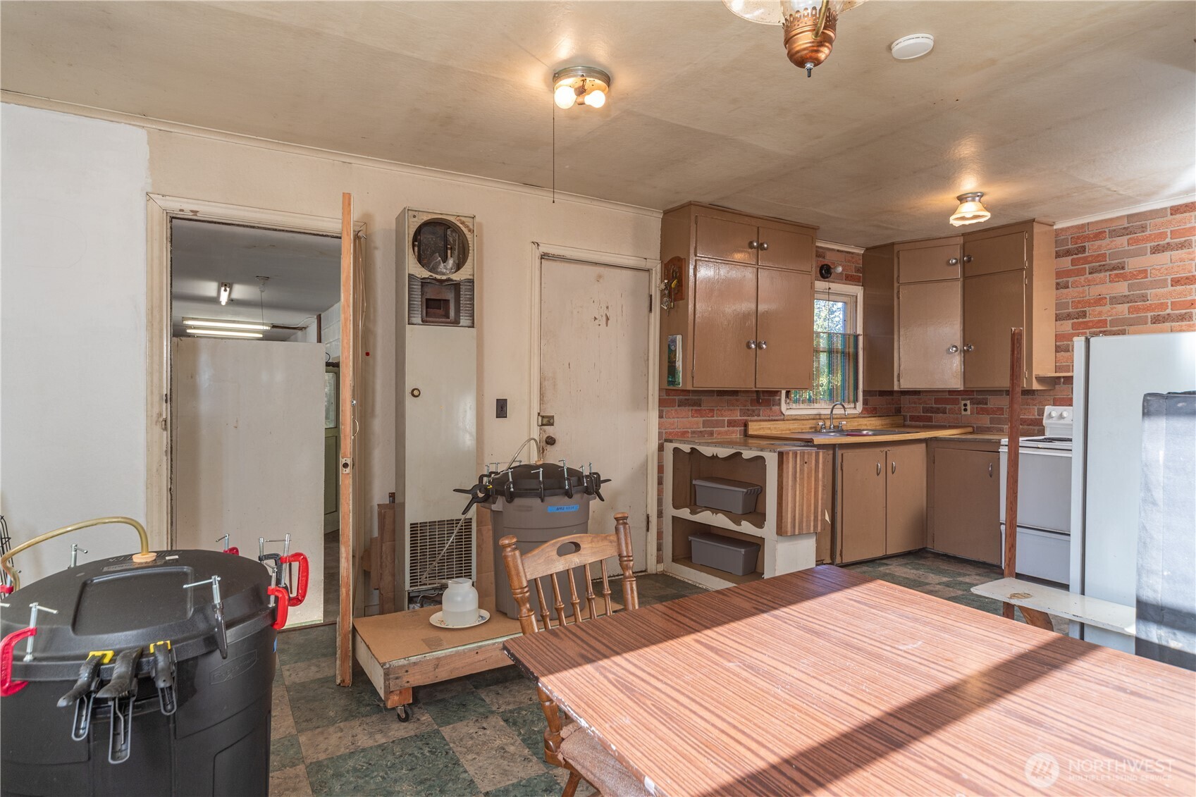 781 Irondale Road Port Hadlock, WA 98339 - Photo 12 of 25 a kitchen with kitchen island a counter top space a sink stainless steel appliances and cabinets