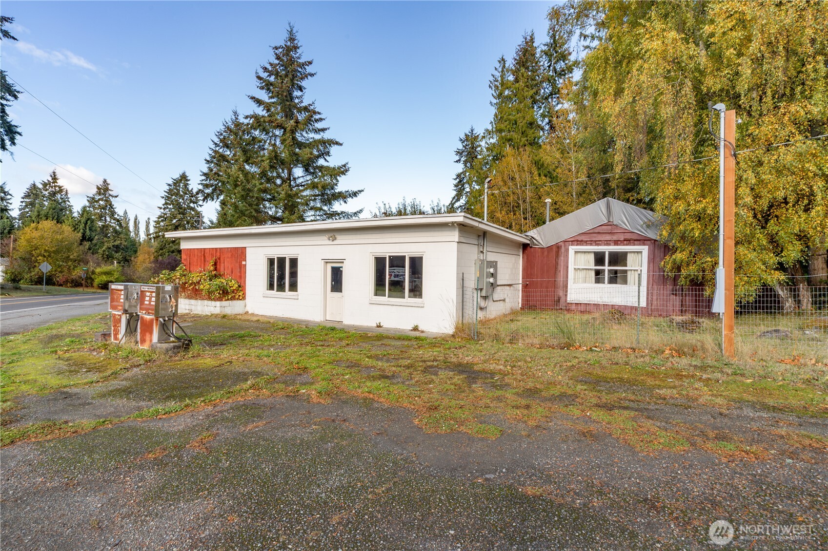 781 Irondale Road Port Hadlock, WA 98339 - Photo 2 of 25 a house with trees in the background