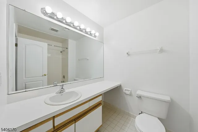 a view of a house with a door and a window