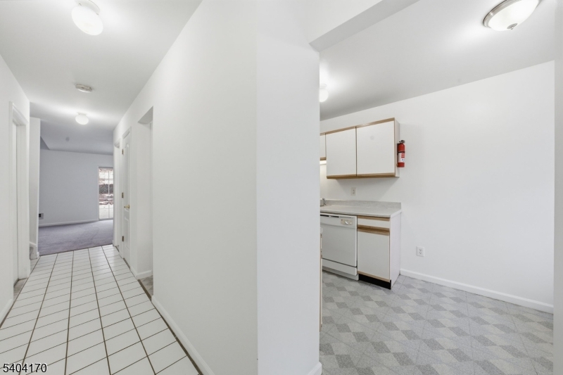 403 Union Street Boonton, NJ 07005 - Photo 5 of 24 a view of a kitchen with a sink and a stove top oven