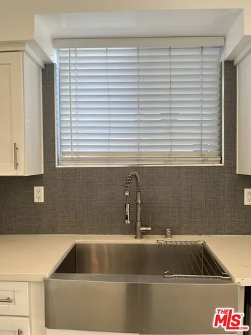 a bathroom with a sink and a bathtub