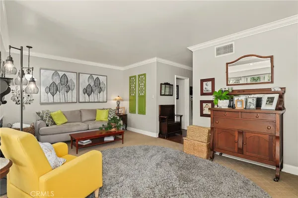 a living room with furniture and a couch