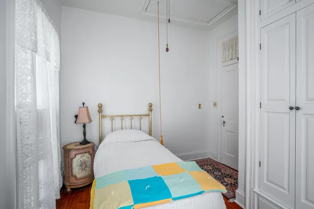 a bathroom with a sink mirror and vanity
