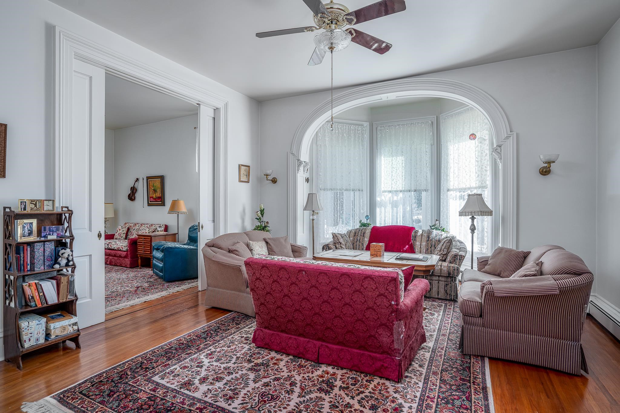 704 River Street Sabula, IA 52070 - Photo 26 of 33 a living room with furniture and a book shelf