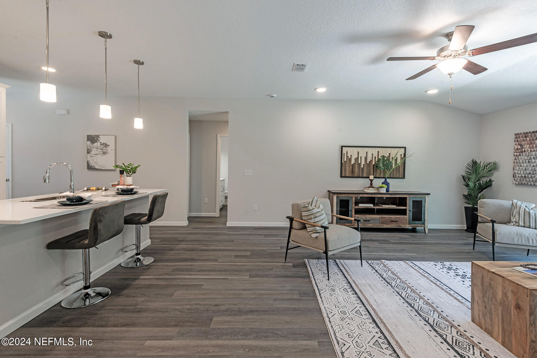 11814 Dunn Creek Road Jacksonville, FL 32218 - Photo 28 of 50 a kitchen with a sink cabinets and wooden floor
