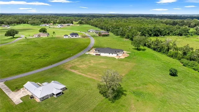 a view of a golf course with a garden
