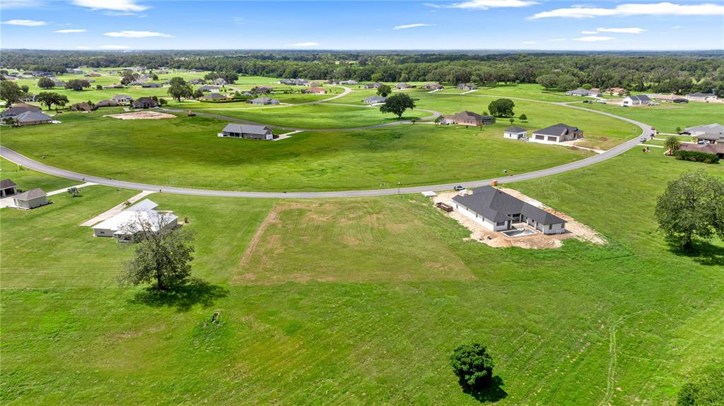 0 Northwest 17th Street Ocala, FL 34475 - Photo 7 of 13 an aerial view of a golf course with a garden