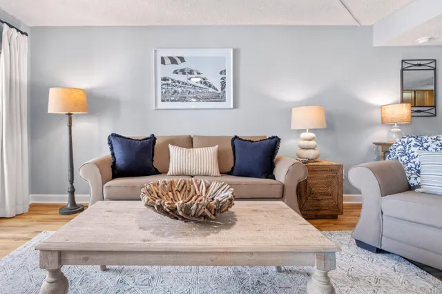 a bedroom with a bed and lamp