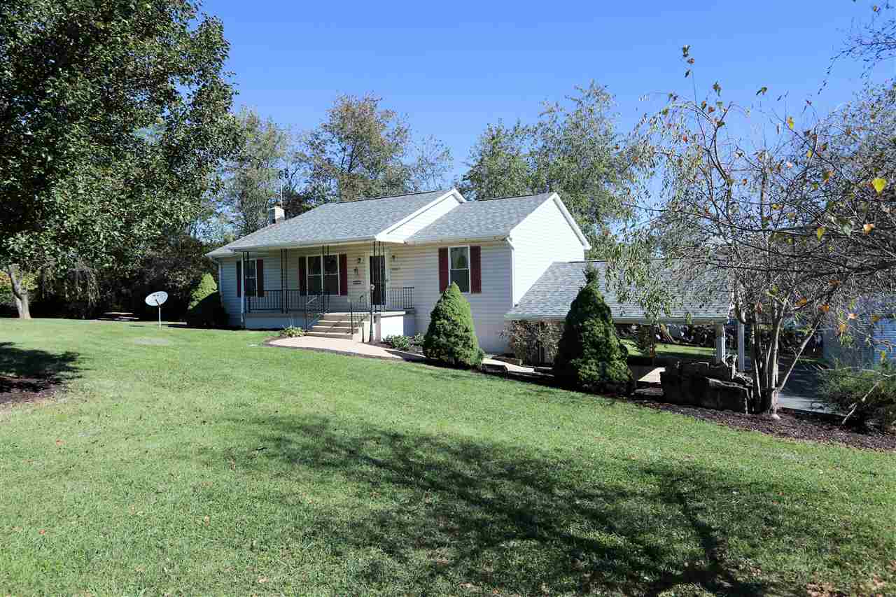 2003 Shutterlee Mill Road Staunton, VA 24401 - Photo 1 of 45 a view of a house with a backyard porch and sitting area