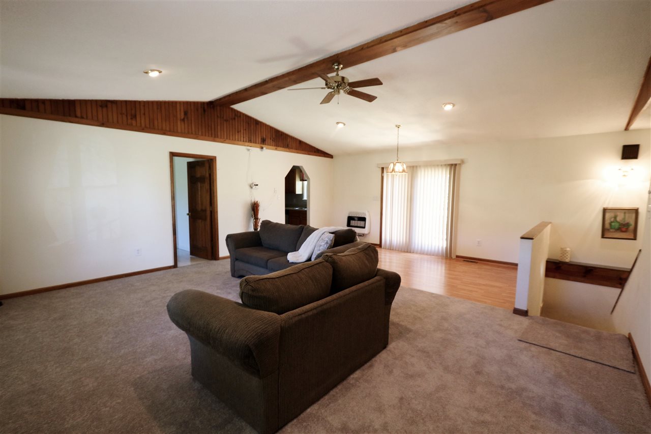 2003 Shutterlee Mill Road Staunton, VA 24401 - Photo 11 of 45 a living room with furniture and a glass door