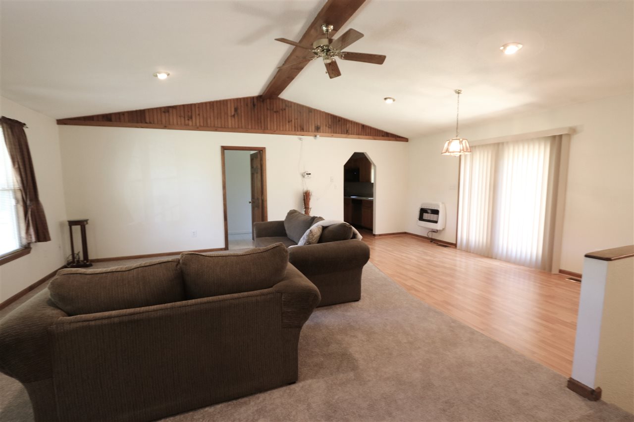 2003 Shutterlee Mill Road Staunton, VA 24401 - Photo 13 of 45 a living room with furniture and a ceiling fan