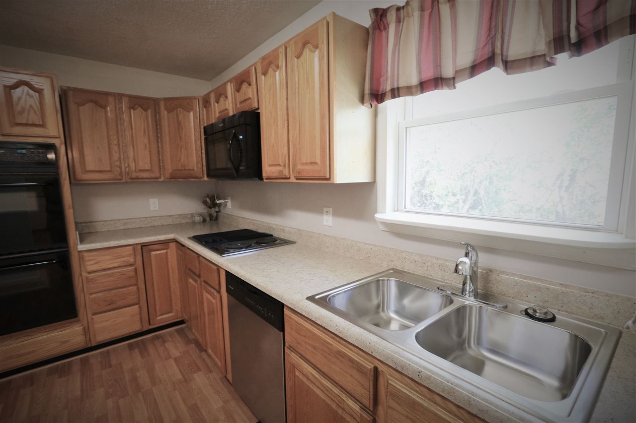 2003 Shutterlee Mill Road Staunton, VA 24401 - Photo 18 of 45 a kitchen with a sink cabinets and stainless steel appliances