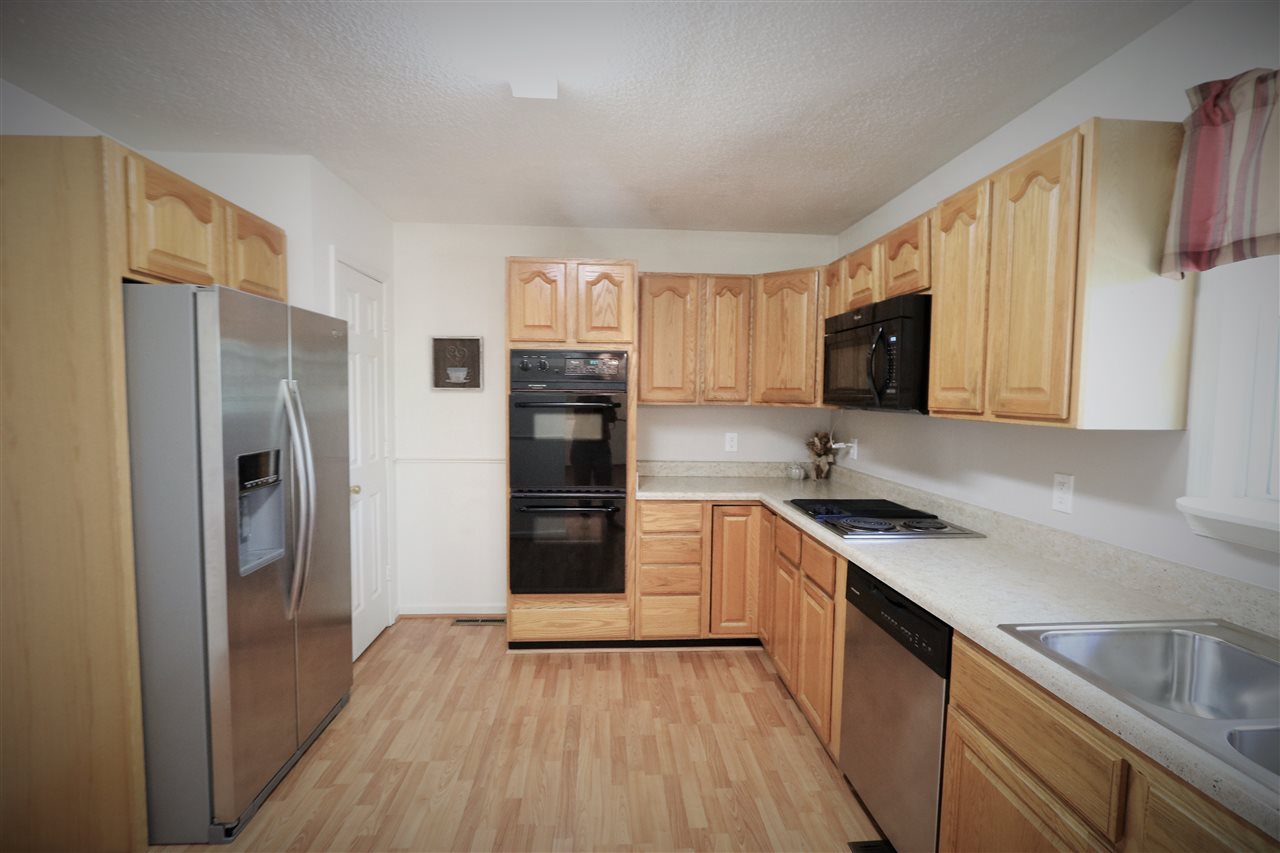 2003 Shutterlee Mill Road Staunton, VA 24401 - Photo 19 of 45 a kitchen with a refrigerator stove and microwave