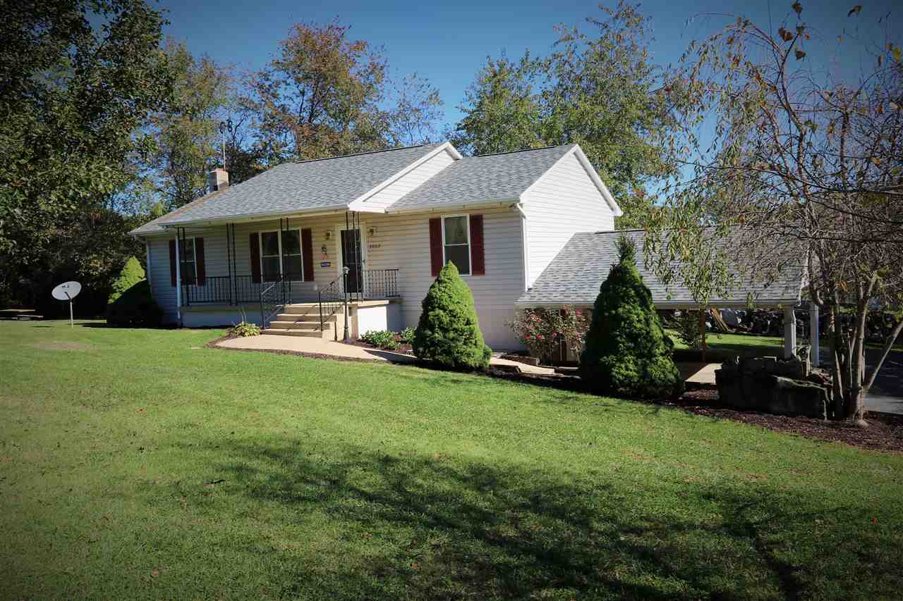 2003 Shutterlee Mill Road Staunton, VA 24401 - Photo 2 of 45 a front view of a house with a yard and trees