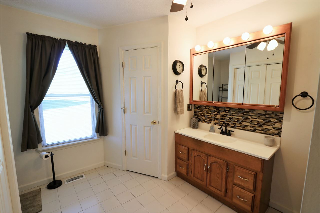 2003 Shutterlee Mill Road Staunton, VA 24401 - Photo 25 of 45 a bathroom with a sink and a mirror