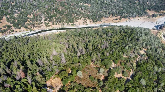 a view of a backyard of the house