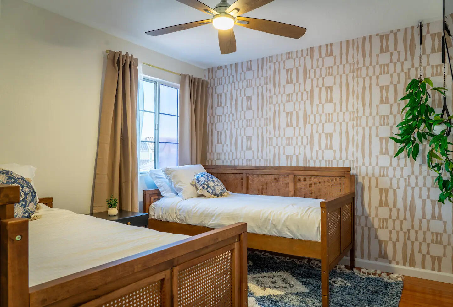 81032 Red Bluff Road Indio, CA 92201 - Photo 21 of 33 a bedroom with a bed and a chandelier