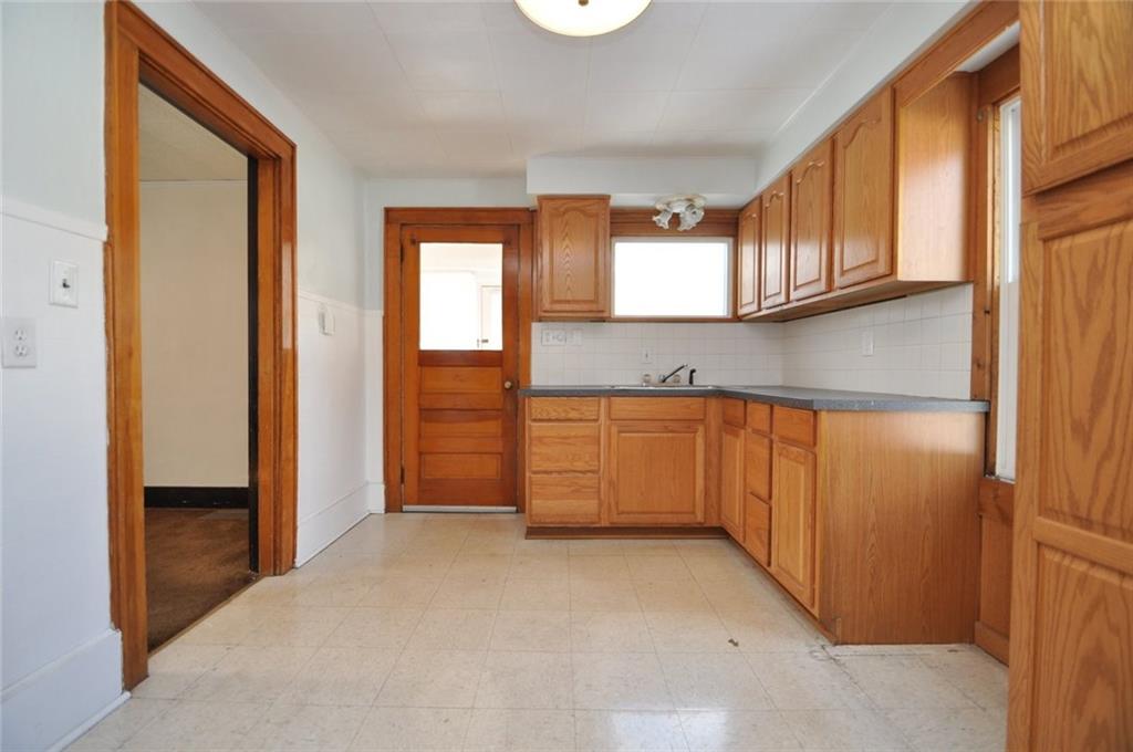 24 Oak Spring Road Washington, PA 15301 - Photo 6 of 25 Main House - Kitchen has access to dining room, living room and back enclosed 3 seasons room....great mudroom!