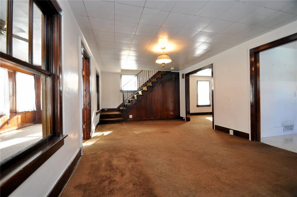 24 Oak Spring Road Washington, PA 15301 - Photo 7 of 25 Main House - Living Room with steps leading to upper level
