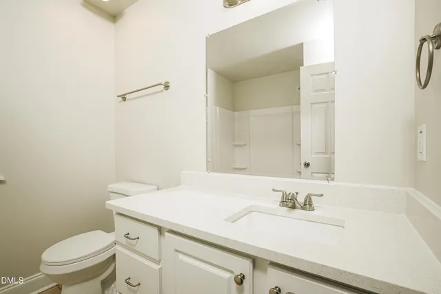 a view of house with backyard