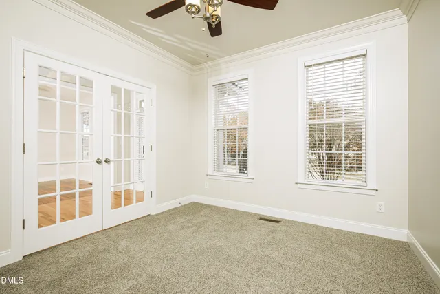 an empty room with windows