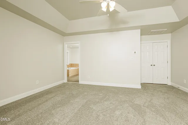 a bathroom with a shower and a sink