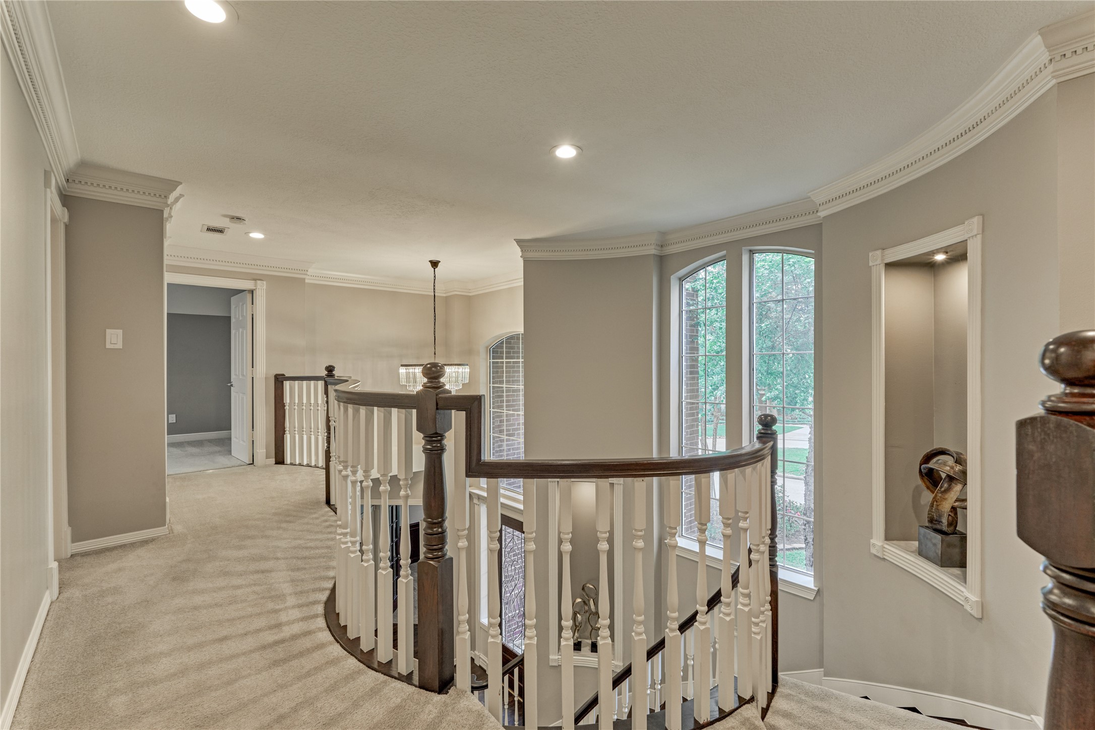 7 Gentry Oak Court Spring, TX 77381 - Photo 30 of 50 a view of a hallway with wooden floor and entryway