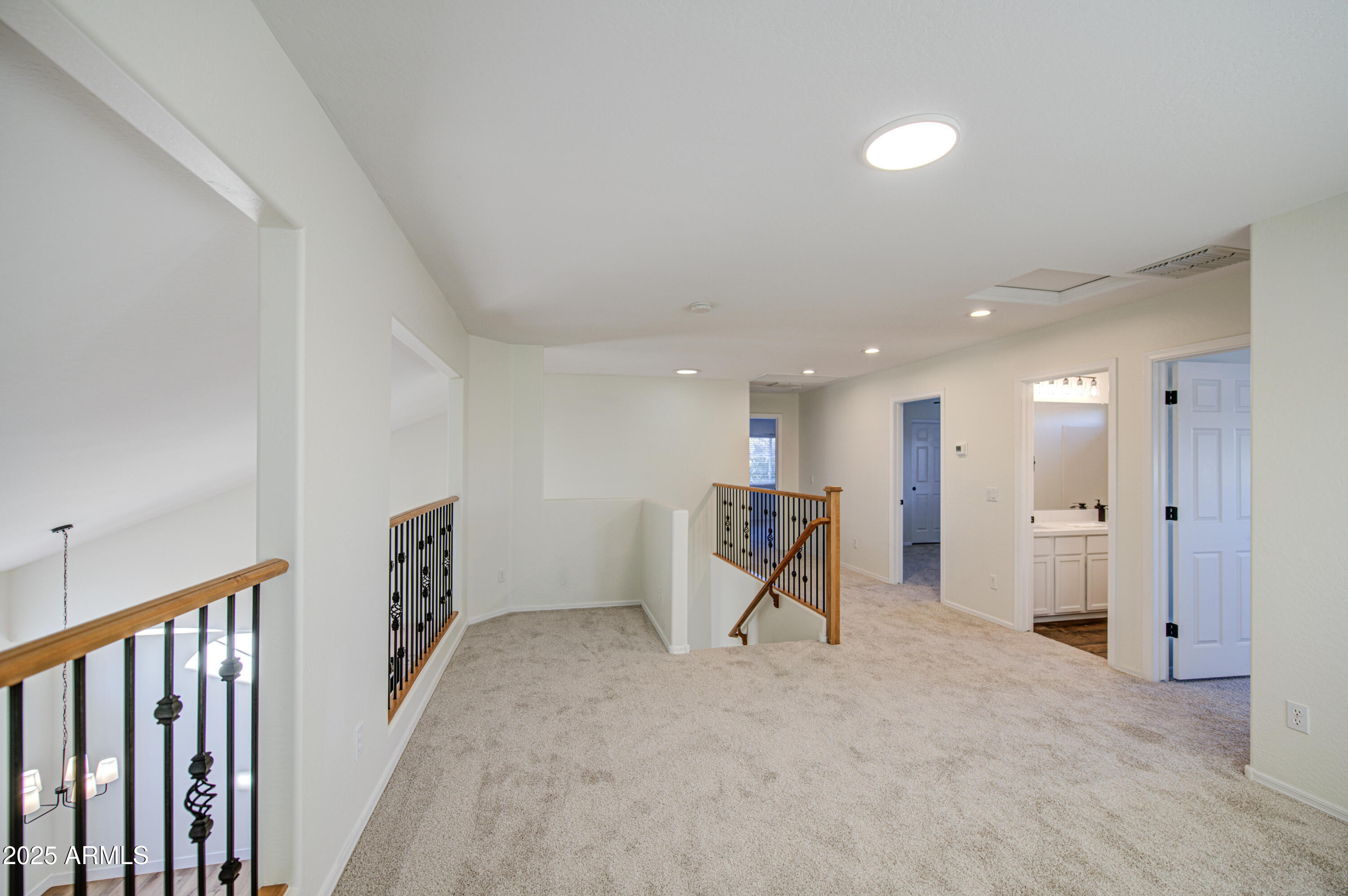 22022 West Moonlight Path Buckeye, AZ 85326 - Photo 20 of 49 a view of a hallway with a room