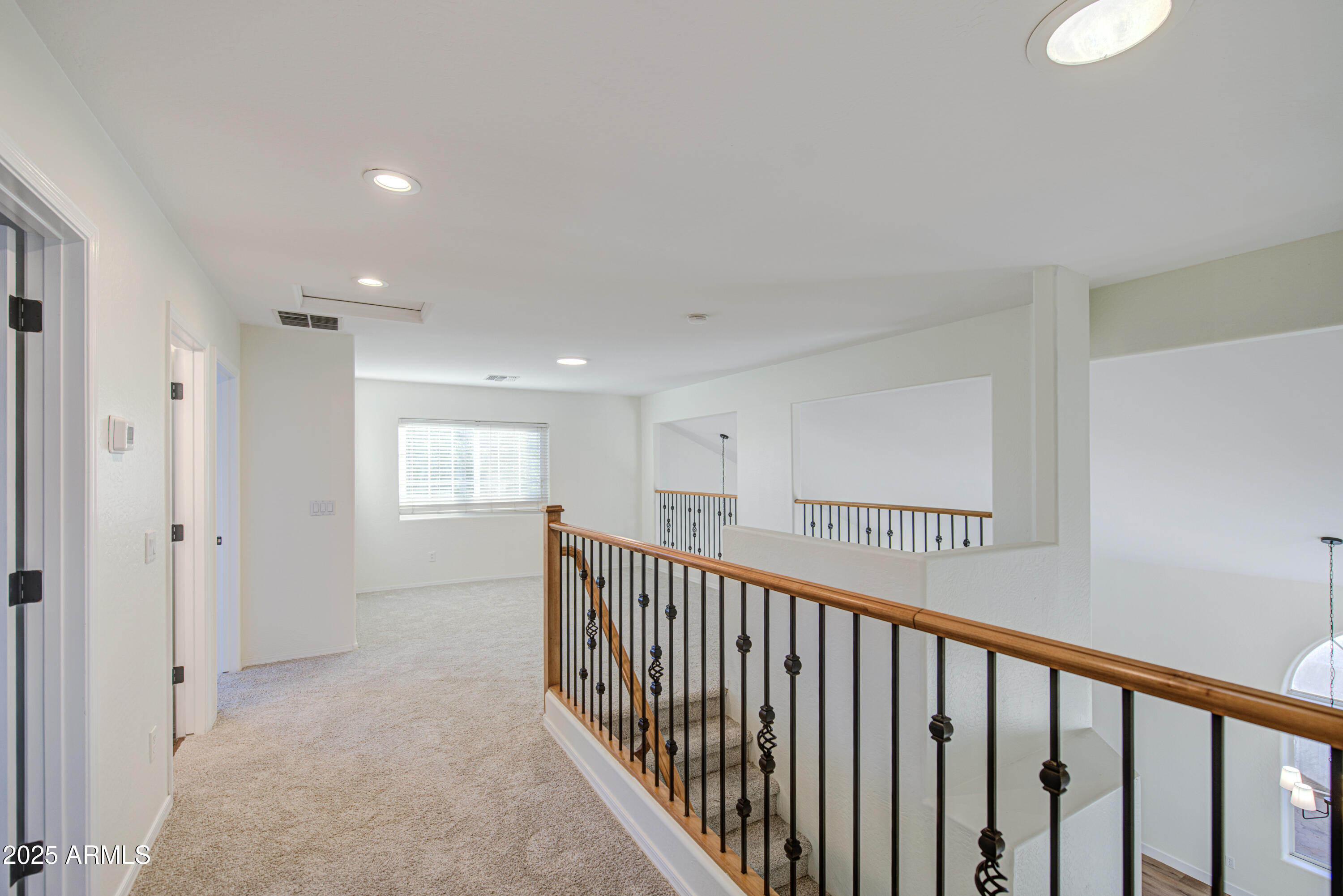 22022 West Moonlight Path Buckeye, AZ 85326 - Photo 21 of 49 a view of hallway with stairs