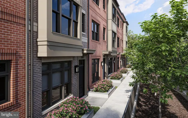 a picture of a bench in front of building