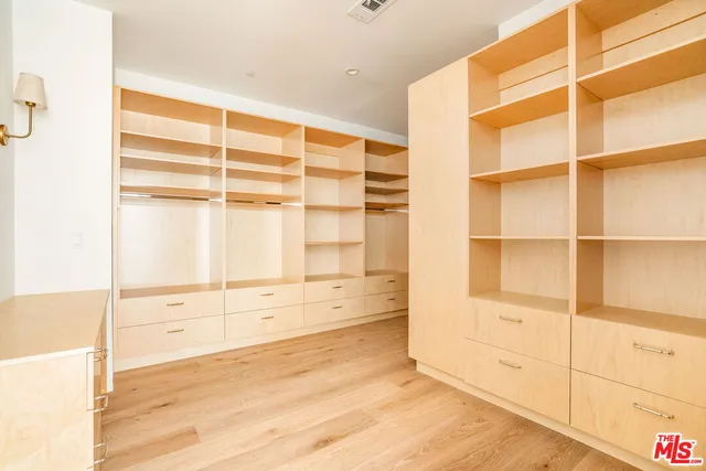 a view of a living room and entryway