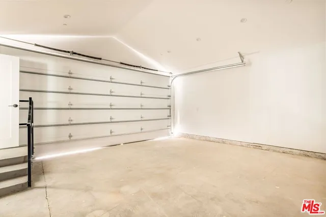 a bathroom with a sink and a large window