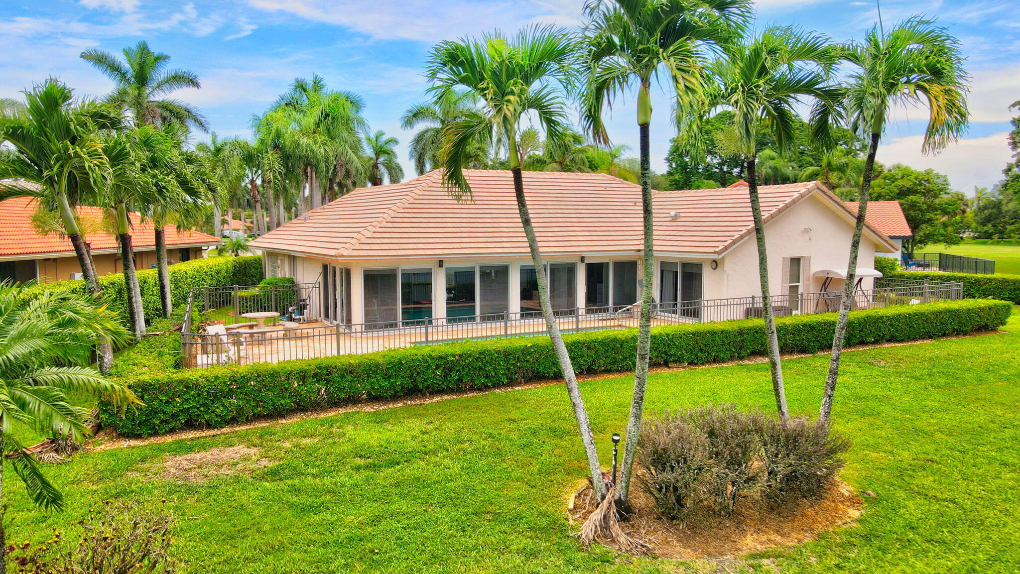 10321 Milburn Lane Boca Raton, FL 33498 - Photo 9 of 80 WELL MANICURED LAWN