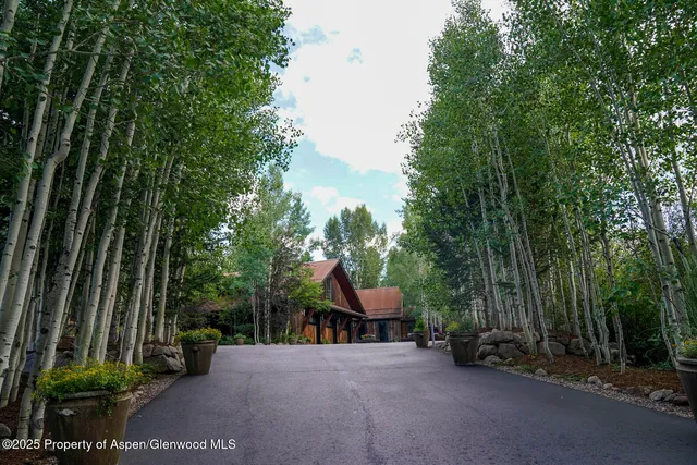a view of a car park in front of a building