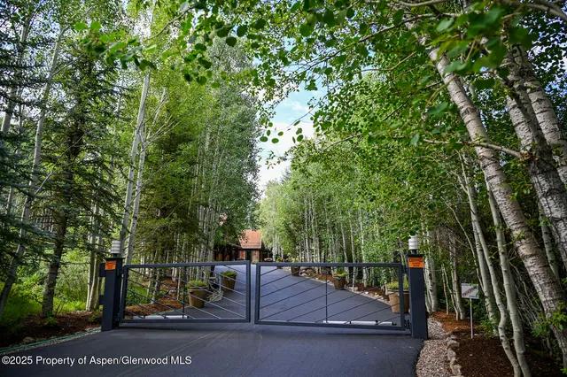 a bathroom with a sink double vanity and a mirror