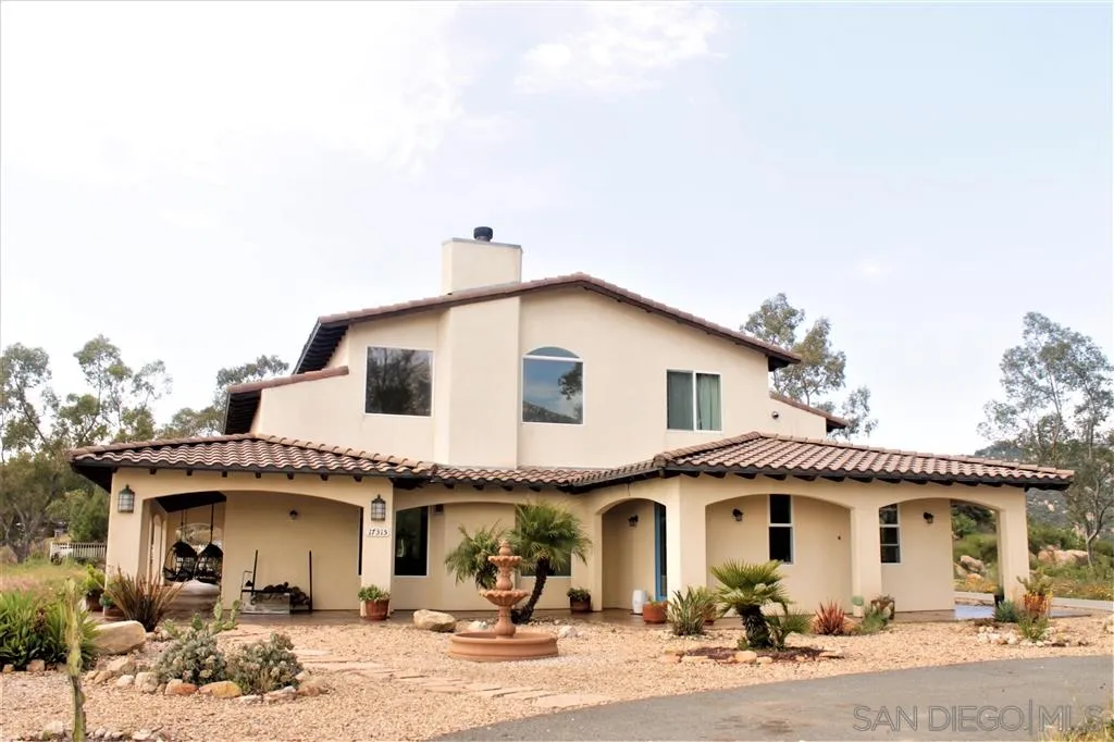 a front view of a house with a porch