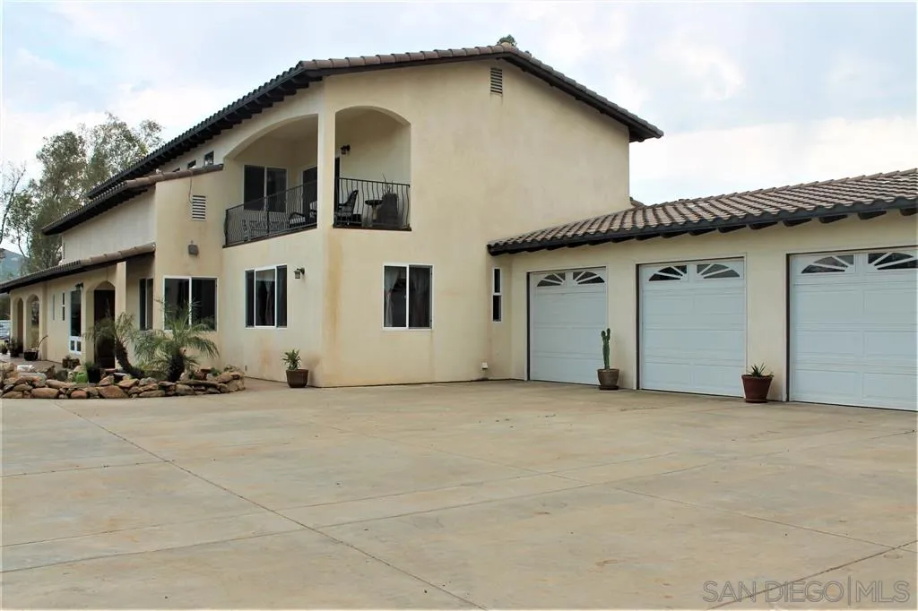 17315 Lyons Creek Road Jamul, CA 91935 - Photo 17 of 25 a view of a house with backyard