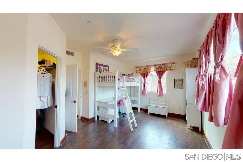 17315 Lyons Creek Road Jamul, CA 91935 - Photo 9 of 25 a living room with furniture and wooden floor