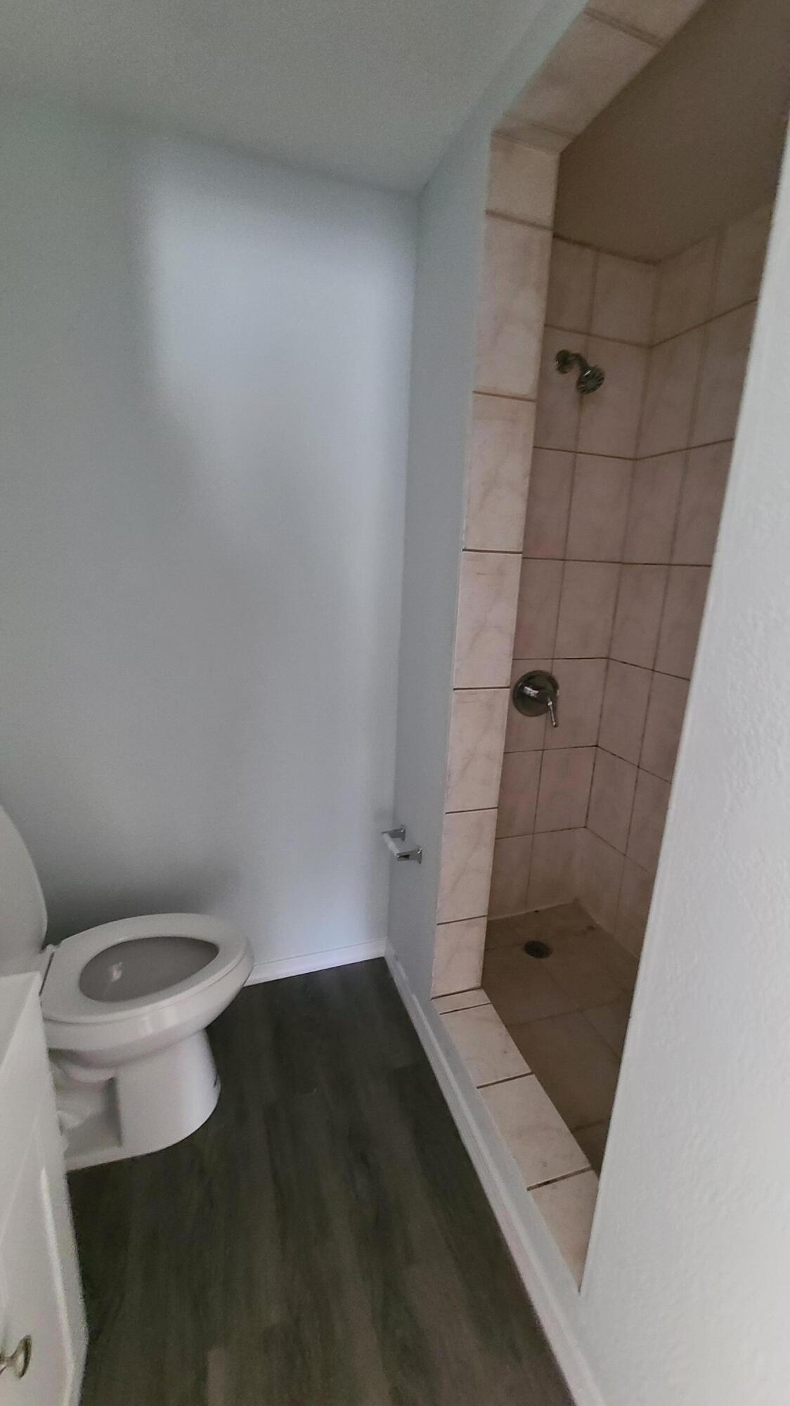 921 14th Street West Palm Beach, FL 33401 - Photo 17 of 36 a bathroom with a sink and a toilet