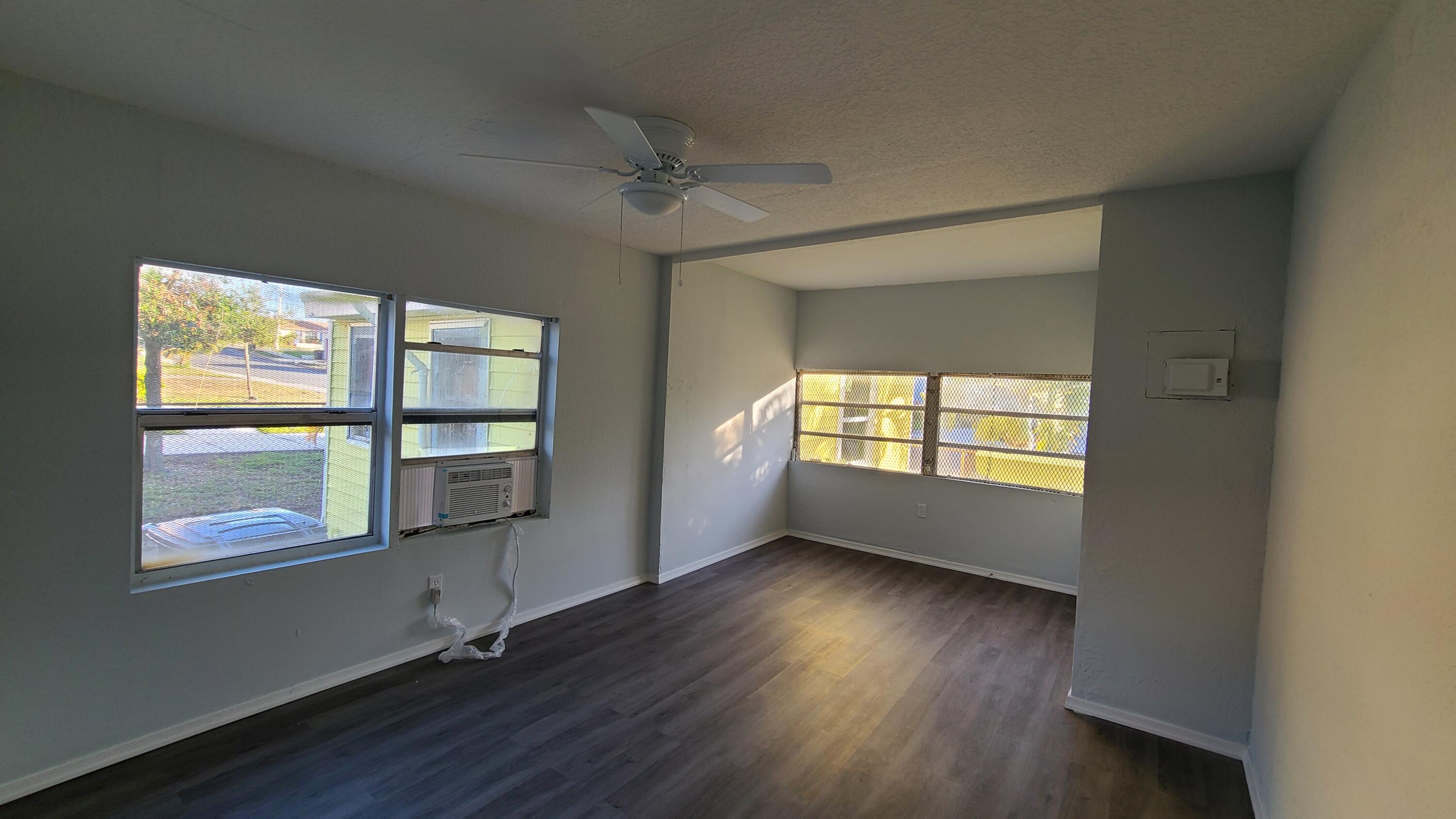 921 14th Street West Palm Beach, FL 33401 - Photo 24 of 36 a view of empty room with wooden floor and fan