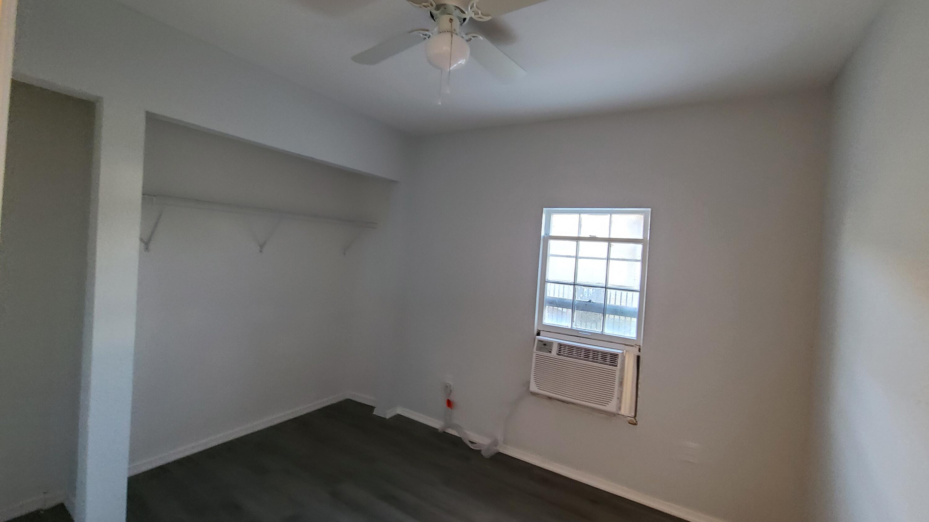 921 14th Street West Palm Beach, FL 33401 - Photo 26 of 36 an empty room with a window
