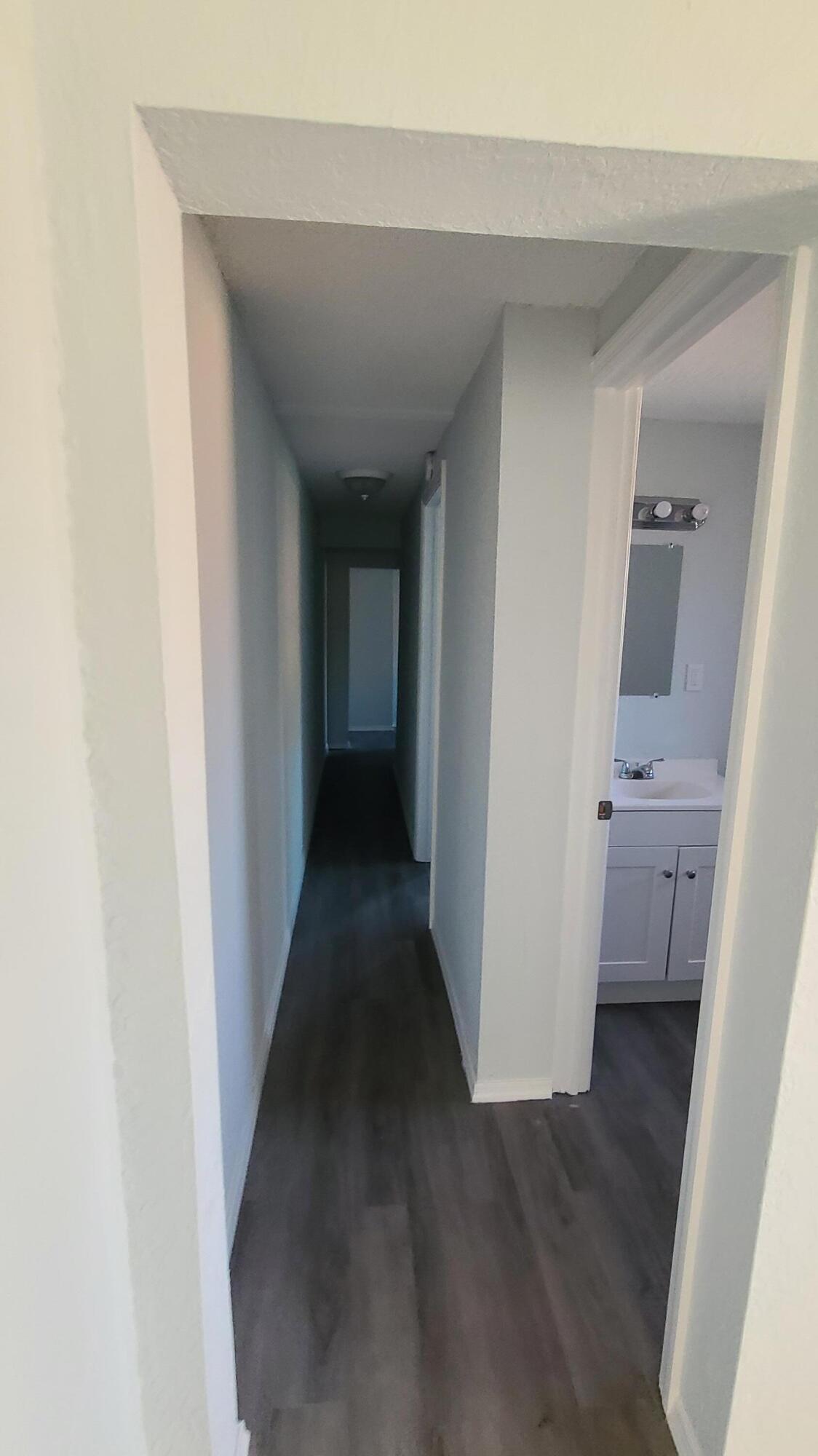 921 14th Street West Palm Beach, FL 33401 - Photo 33 of 36 a view of a hallway with a white walls