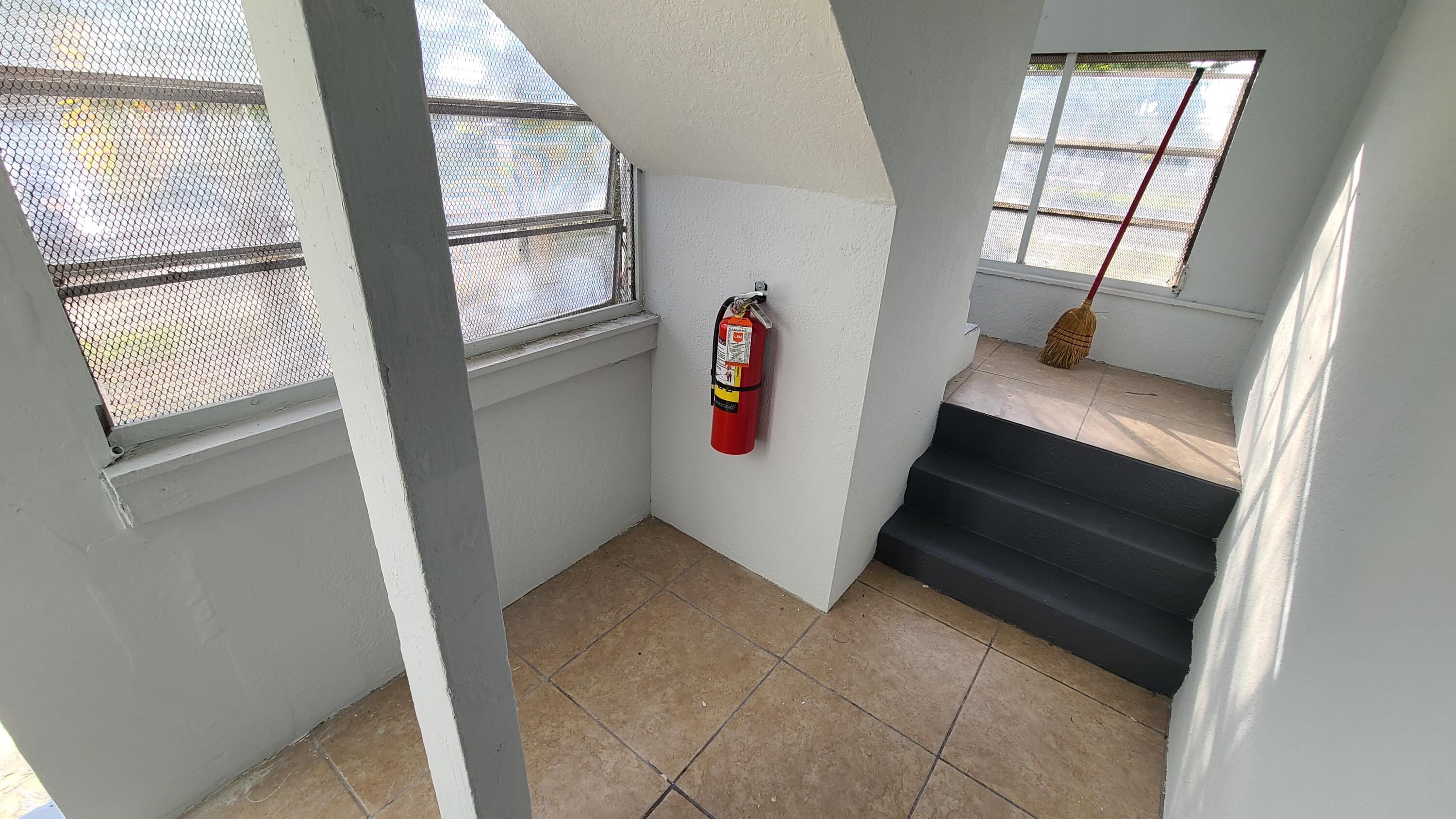 921 14th Street West Palm Beach, FL 33401 - Photo 4 of 36 a utility room with window and an empty room